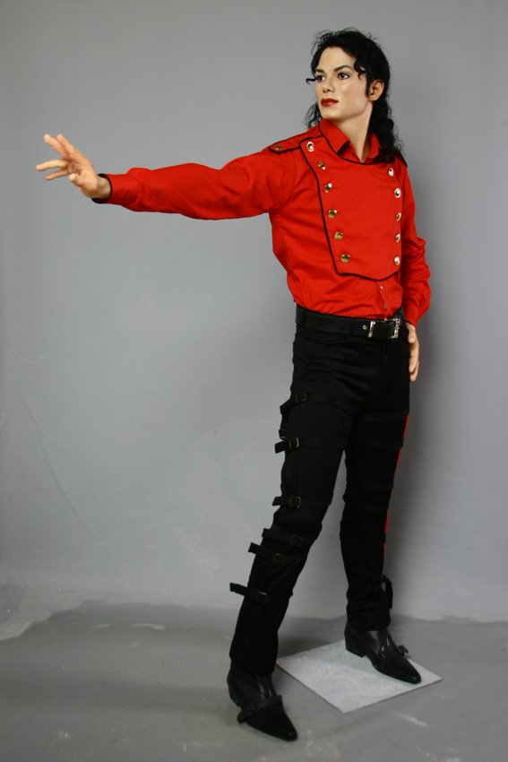Full-length view of Michael Jackson waxwork set up in dance stance.
