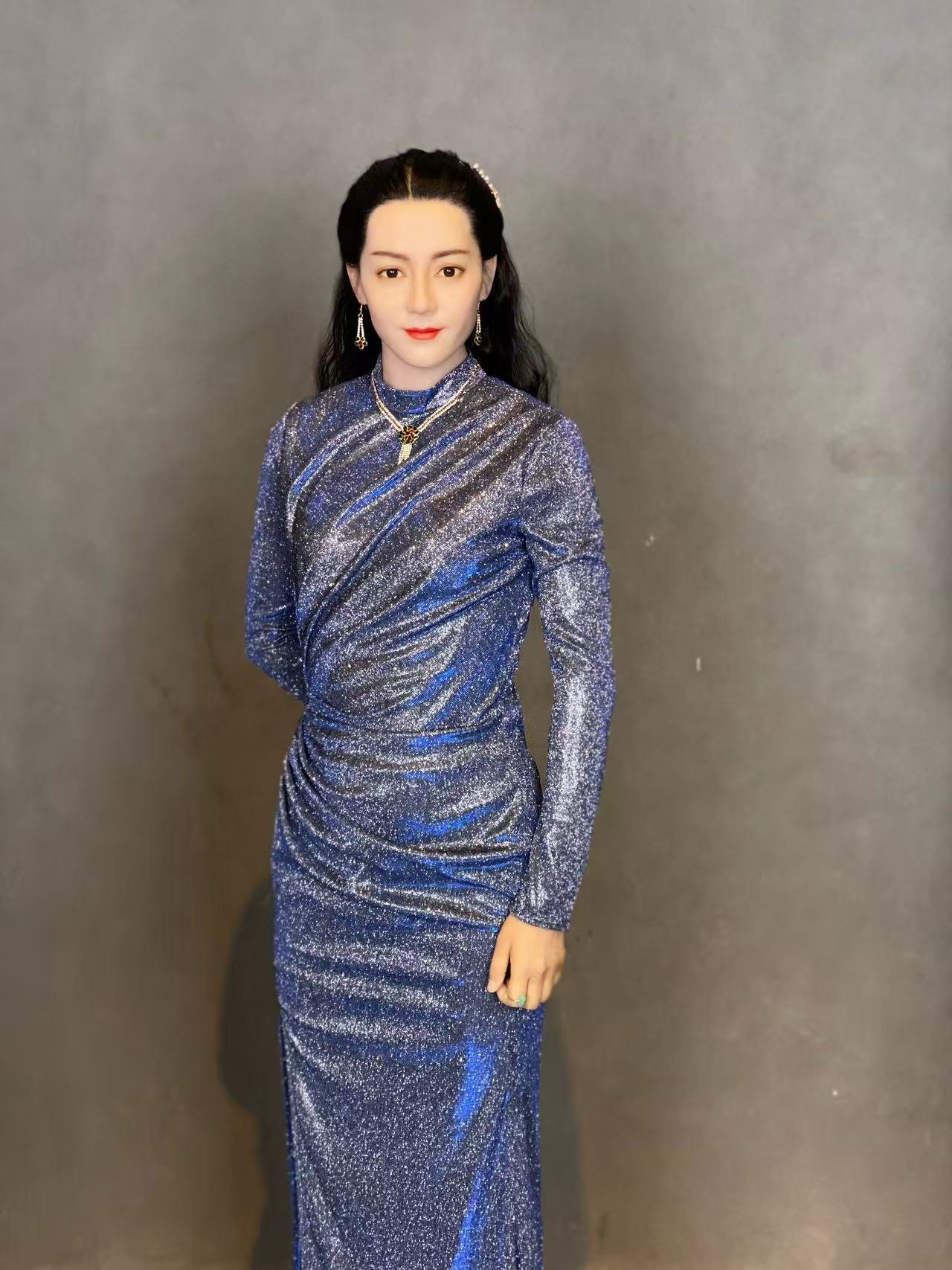 Blue evening-dress portrait wax figure