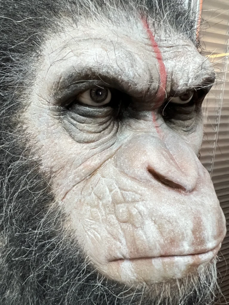 Close-up craftsmanship of the Caesar-inspired ape wax bust.