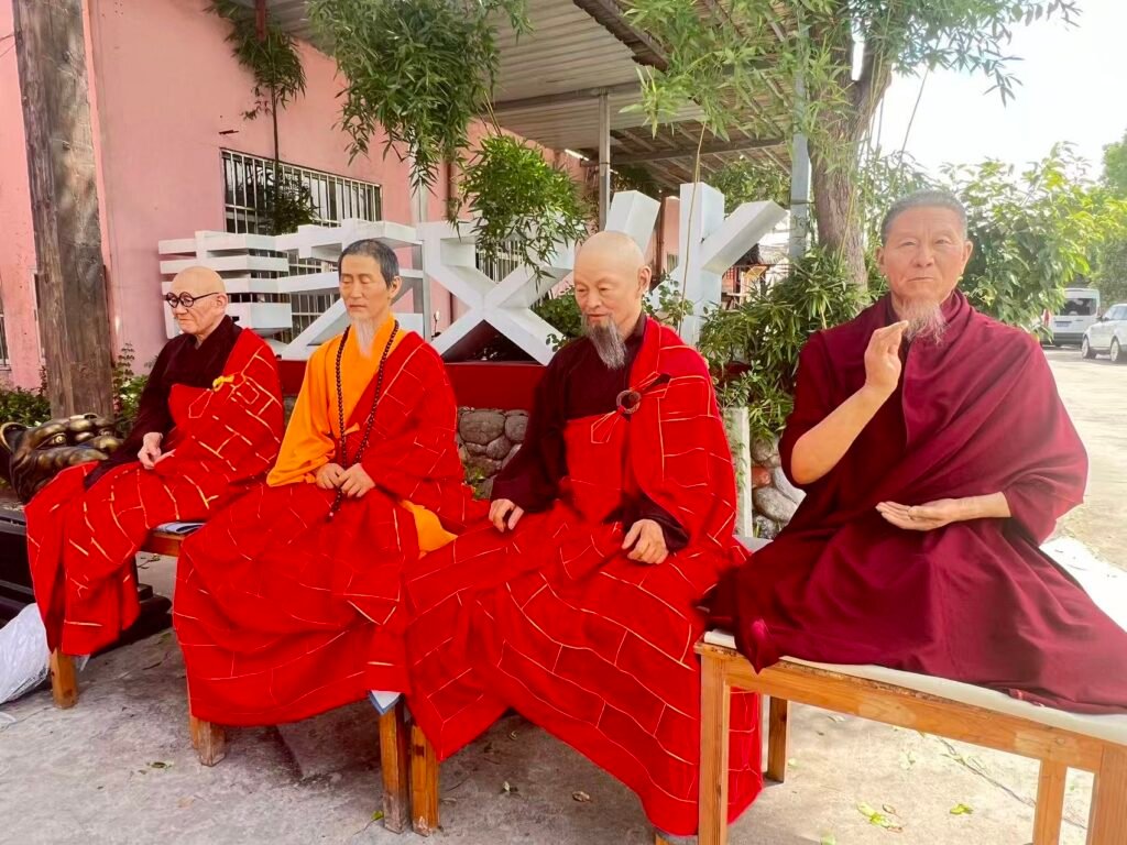 Completed religious wax figures in ceremonial robes